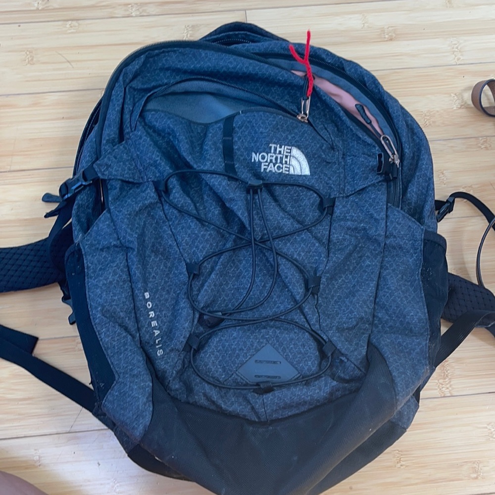 North face gray backpack with peach interior